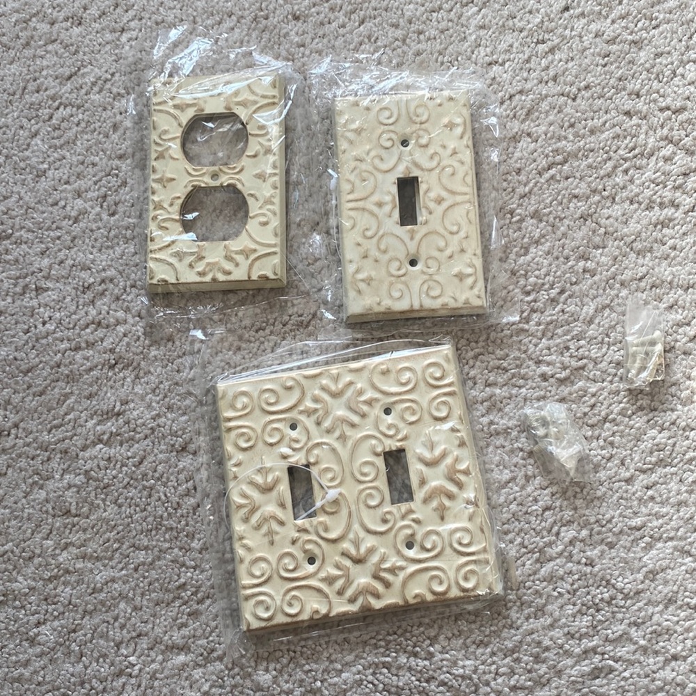 Set of five outlet/light switch covers